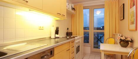 Fridge, oven, dishwasher, high chair