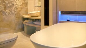 Combined shower/tub, hair dryer, towels, soap