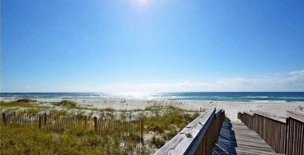 Walk along the beachfront boardwalk to the ocean's edge.