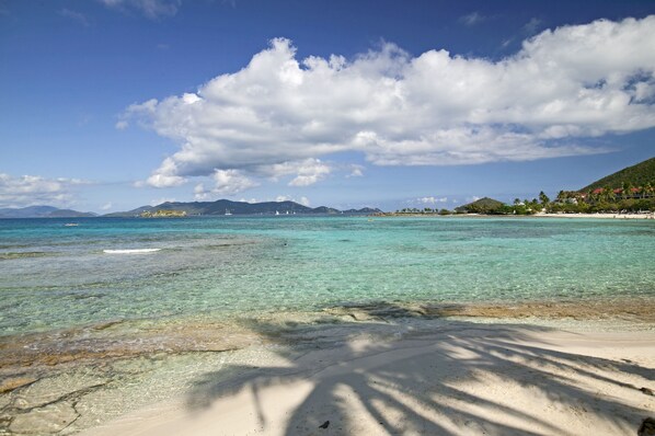 On the beach, sun-loungers, beach towels