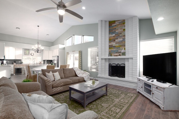 Living Room with 65 inch TV, DVD player with Netflix, wood burning fireplace