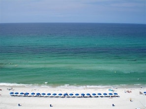 On the beach, sun-loungers