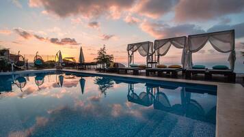 Outdoor pool, pool umbrellas, pool loungers