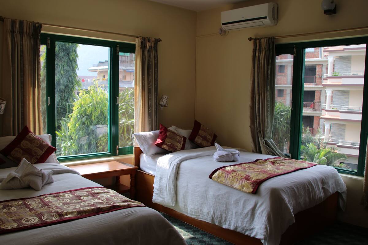 Deluxe Suite, Multiple Beds, Private Bathroom, Mountain View | In-room safe, desk, free WiFi