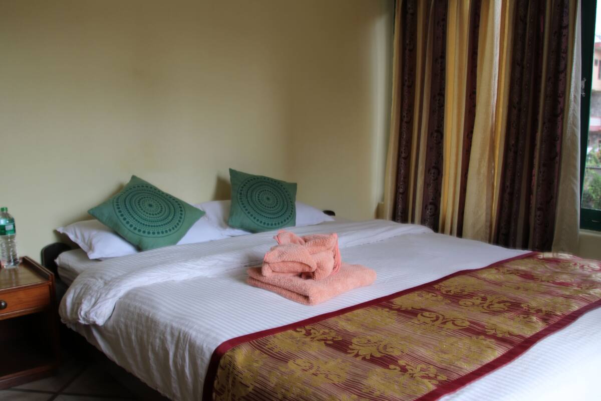 Deluxe Double Room, Multiple Beds, Private Bathroom, Garden View | In-room safe, desk, free WiFi