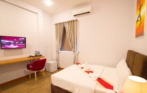 Deluxe Double Room | Minibar, in-room safe, WiFi (free), bed sheets - Secrets Hotel Cambodia (Phnom Penh)
