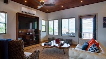 Premium Villa, Multiple Bedrooms, Non Smoking, Ocean View | Living room | Flat-screen TV, DVD player