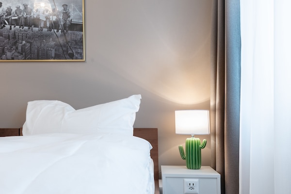 Twin Room, Garden View | Desk, iron/ironing board, free cribs/infant beds, free WiFi