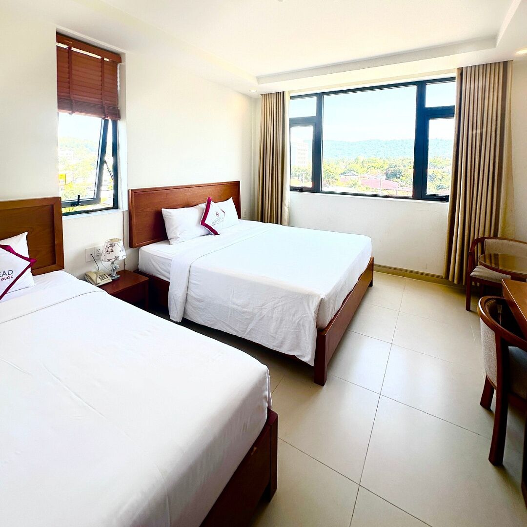 deluxe triple room, city view | 1 bedroom, premium bedding, memory-foam beds, minibar