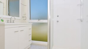 Shower, eco-friendly toiletries, hair dryer, soap