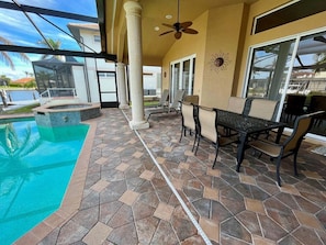 Outdoor dining - Waterfront 4BR home in Marco Island with heated pool and WiFi (Marco Island)