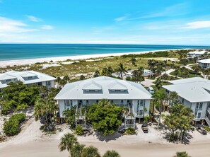 Exterior - Enjoy a Beautiful Gulf Sunset from the Screened Porch on Resort Villa A3221B (Cape Haze)