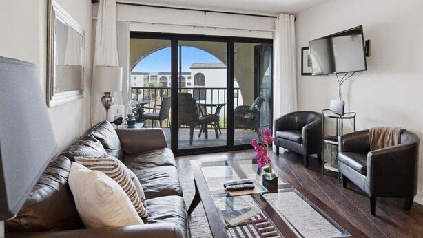 Living area - Waterfront 1BR condo in Marco Island with pool, marina access, and WiFi. (Marco Island)