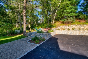 Stroll through the beautifully landscaped grounds, surrounded by lush trees and vibrant flowers.