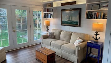 TV, fireplace, books