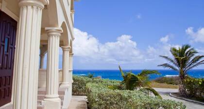 Luxury cliff apartment with pool and sea views.