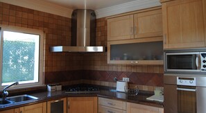 Fridge, microwave, oven, stovetop - Luxury 4 bedroom Villa with private pool and garden (Sta. Eulalia)