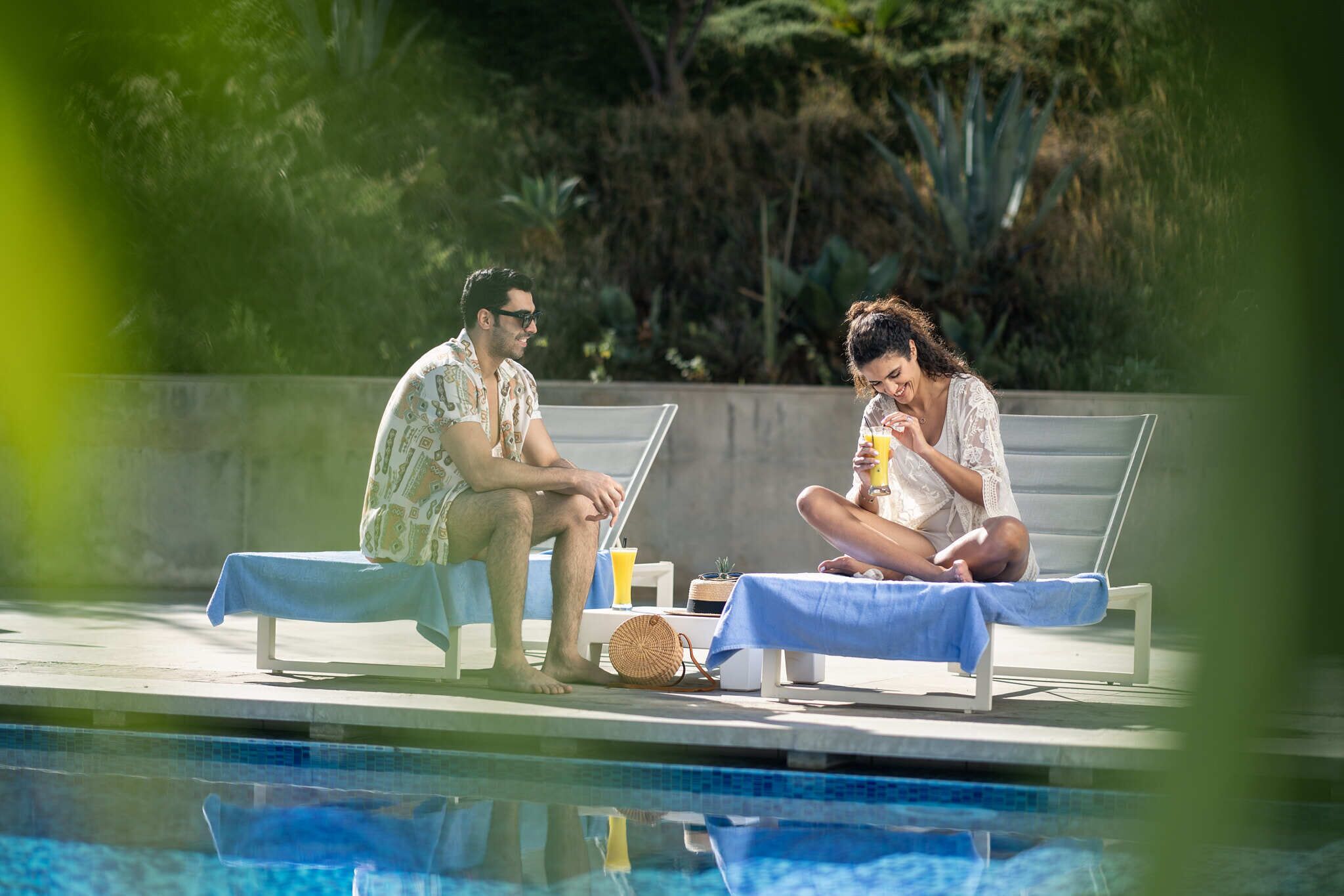 2 indoor pools, outdoor pool, open 9 am to 8:00 pm, pool umbrellas