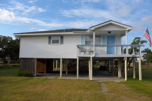 Front with under house parking