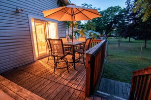 Outdoor dining - Charlevoix Family Home ~  In Town Home, Newly Renovated, Fire Pit, Hot Tub!!! (Charlevoix)
