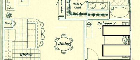 A floor plan of a house with a master bedroom, two bathrooms, a dining area, a kitchen, a living room, and a lanai.