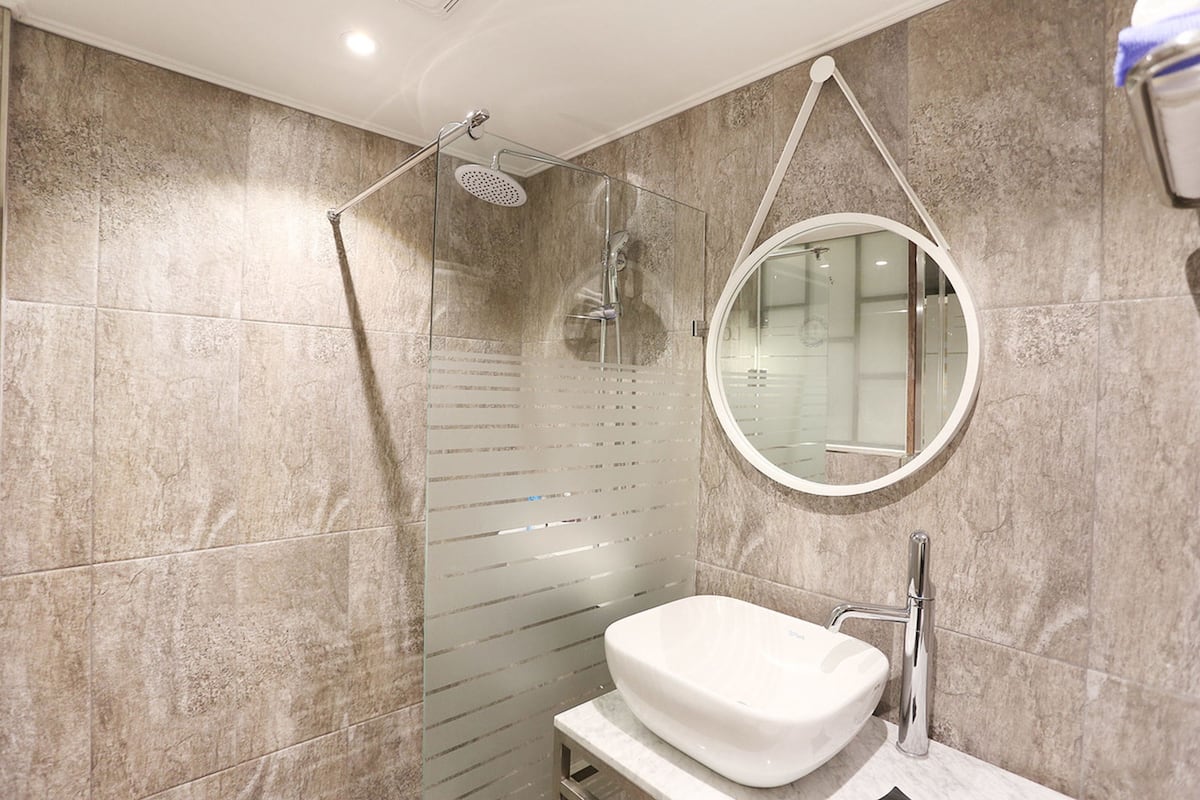 standard room b type (netflix, disney+, watcha, laftel available) | bathroom | free toiletries, hair dryer, bathrobes, slippers