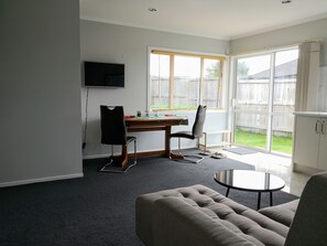 Apartment, 1 Bedroom | Living area | Flat-screen TV - Comfy & Modern Guest House (Rotorua)