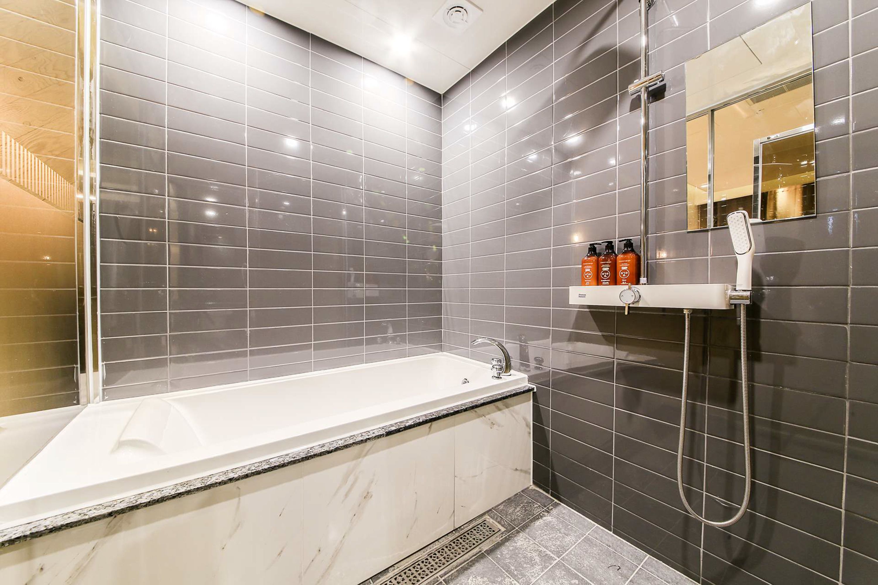 hair dryer, bathrobes, slippers, bidet