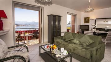 Standard Suite, Harbor View | Living area | Flat-screen TV