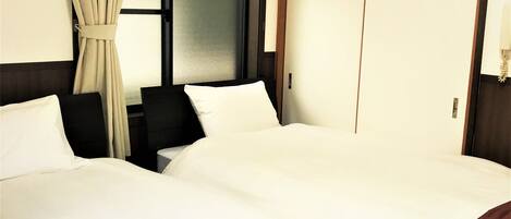 Basic Twin Room | Desk, free WiFi, bed sheets