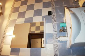 Shower, bidet, towels, soap