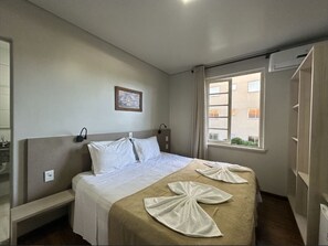 Deluxe Double or Twin Room | Minibar, desk, blackout curtains, soundproofing