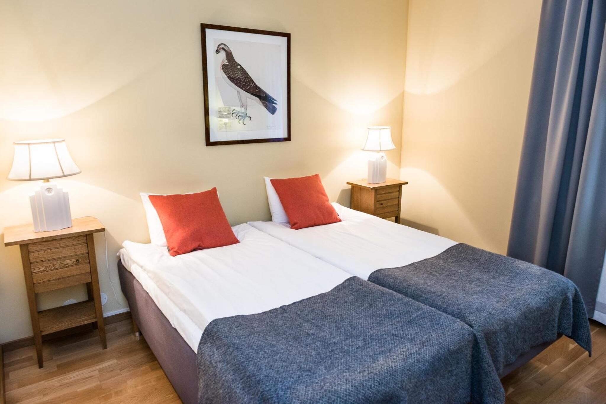 basic double room | pillow-top beds, desk, laptop workspace, blackout curtains