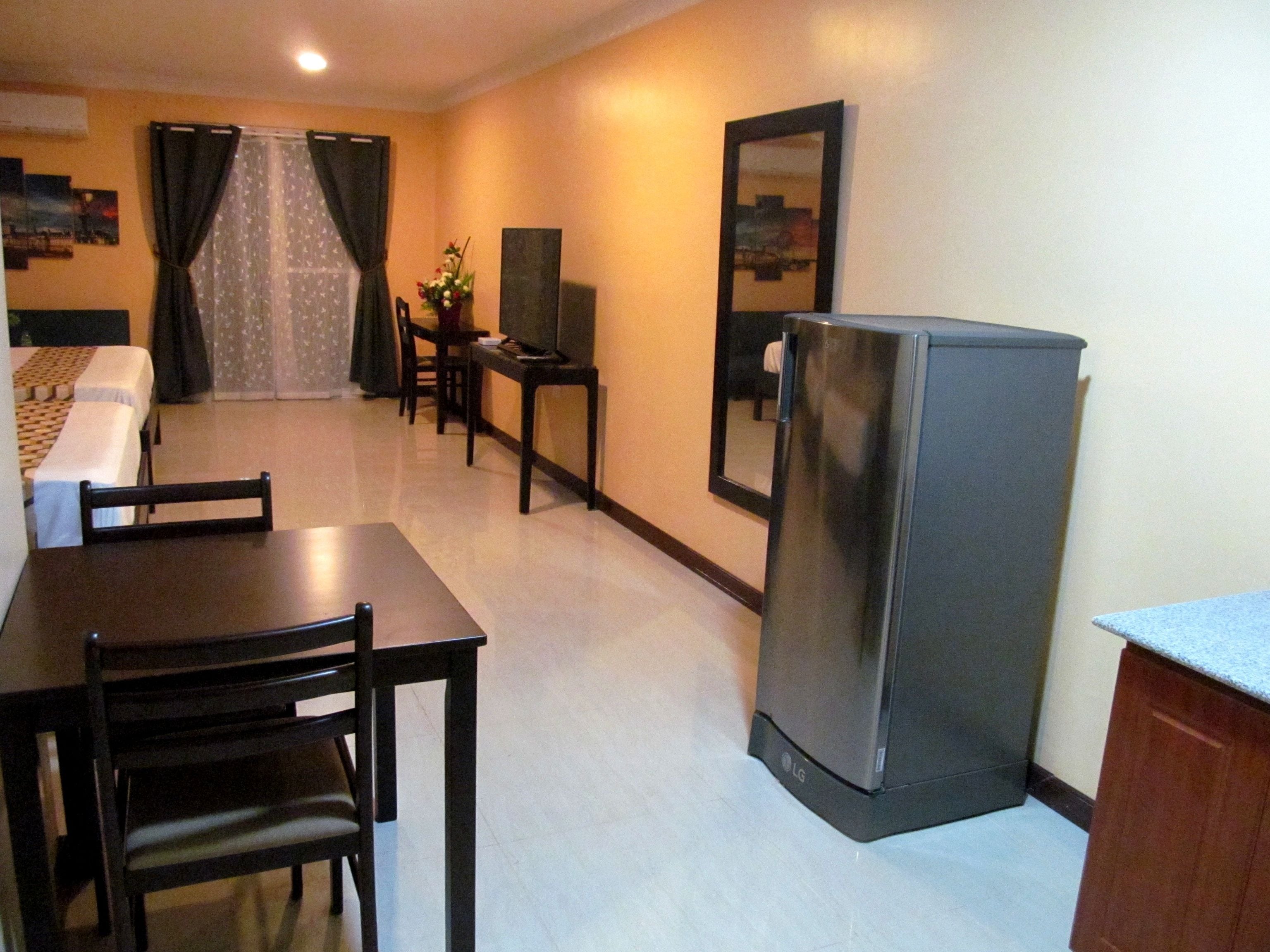 family double room, multiple beds, kitchenette, pool view | 1 bedroom, premium bedding, individually decorated