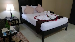 Superior Suite, 1 Bedroom, Refrigerator, Pool View | 1 bedroom, premium bedding, individually decorated