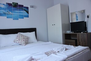 Premium bedding, blackout curtains, free WiFi, bed sheets