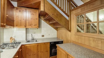 Departamento, 2 habitaciones, planta baja | Cocineta privada | Refrigerador, parrilla de estufa, lavavajillas y utensilios de cocina