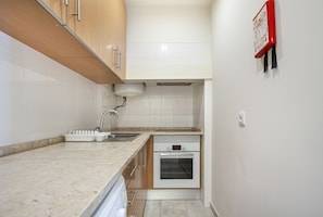 Standard Apartment, 2 Bedrooms, Balcony, City View | Private kitchen | Full-sized fridge, microwave, oven, stovetop
