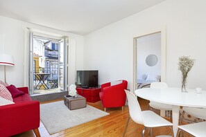 Standard Apartment, 2 Bedrooms, Balcony, City View | Living area | Flat-screen TV