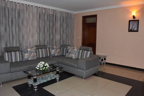 Basic Apartment, 2 Bedrooms, Balcony | Living area | Flat-screen TV, fireplace