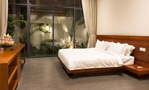 Familien-Suite, Gartenblick | Pillowtop-Betten, Minibar, Zimmersafe, Schreibtisch