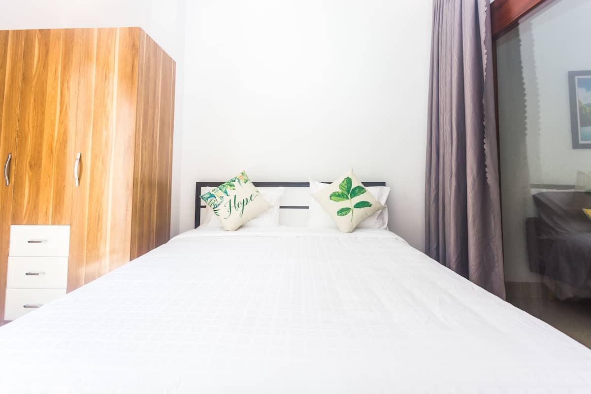 Deluxe Apartment, 1 Bedroom | Desk, iron/ironing board, free WiFi