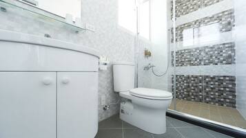 Family Quadruple Room, 1 Bedroom, Balcony, Courtyard Area | Bathroom | Shower, rainfall showerhead, free toiletries, towels