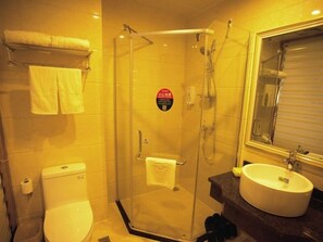 Shower, free toiletries, hair dryer, slippers