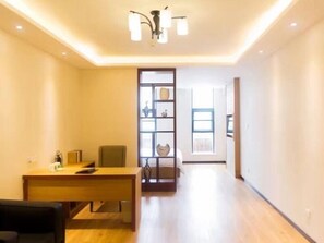 Business Family Room | Blackout drapes, iron/ironing board, free WiFi