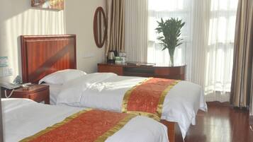 Twin Room | Blackout drapes, iron/ironing board, free WiFi