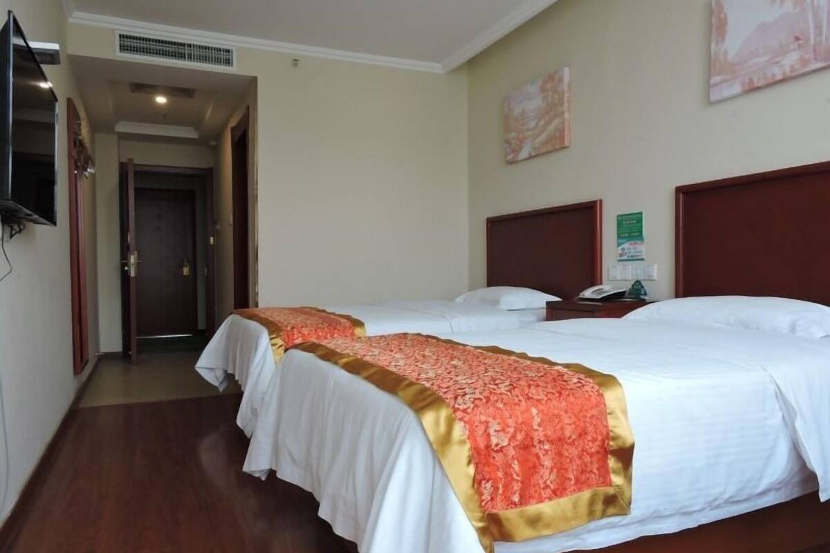 Twin Room | Blackout drapes, iron/ironing board, WiFi (free)
