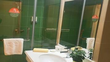 Shower, free toiletries, hair dryer, slippers