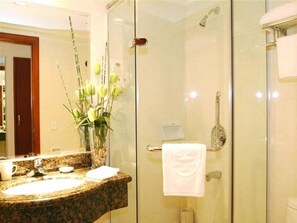 Shower, free toiletries, hair dryer, slippers