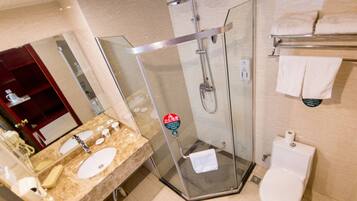 Shower, free toiletries, hair dryer, slippers